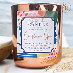 Fill your home with our sensual, mood-setting Crush On You scented soy wax candle. A perfect blend of both airy and sophisticated as well as dark and mysterious. With seduction in the air, the sweet yet salty oceanic accords combine with an undercurrent of citrus, plum, amber, and dark musk. Crush On You is infused with natural essential oils, including cardamom seed and clove leaf. @SparkandRevive