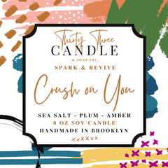 Fill your home with our sensual, mood-setting Crush On You scented soy wax candle. A perfect blend of both airy and sophisticated as well as dark and mysterious. With seduction in the air, the sweet yet salty oceanic accords combine with an undercurrent of citrus, plum, amber, and dark musk. Crush On You is infused with natural essential oils, including cardamom seed and clove leaf. @SparkandRevive