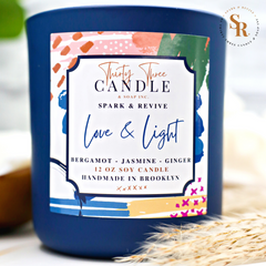 Uplift and transform your space with the soothing scent of our Love & Light scented soy candle. Bringing the ultimate spa experience to your space with an ethereal quality, Love & Light has fresh top notes of mandarin and lemongrass. Elevating this luxurious scent are mid notes of bergamot and ginger. These fragrances blend beautifully with delicate jasmine and white tea to calm your senses and shed the outside world. @SparkandRevive