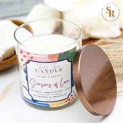 Uplift your mood and awaken your senses with our Seasons of Love scented soy candle. Seasons of Love is a sweet but not overwhelming blend of pineapple, sage, and green leaves. It is sure to put you in good spirits and bring love to your day. Seasons of Love is infused with natural essential oils, including eucalyptus, cedar, vetiver, palmarosa, clary sage, lemongrass, amyris, black pepper, cade, and blue chamomile flower. @SparkandRevive