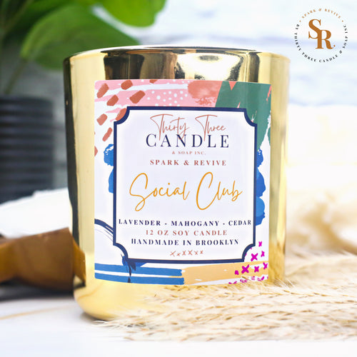 Curl up on the couch or sit in your favorite chair as you take in our Social Club scented soy candle, a rich, warm scent with some spice and comfort.  Cedar wood and oak wood intertwine with warm mahogany to create the perfect masculine scent for any season. Topped with hints of clean lavender, jasmine, lily, and the rosy nuances of geranium, Social Club has plenty of depth and strength.   Social Club is inviting and perfect for year round satisfaction. @SparkandRevive