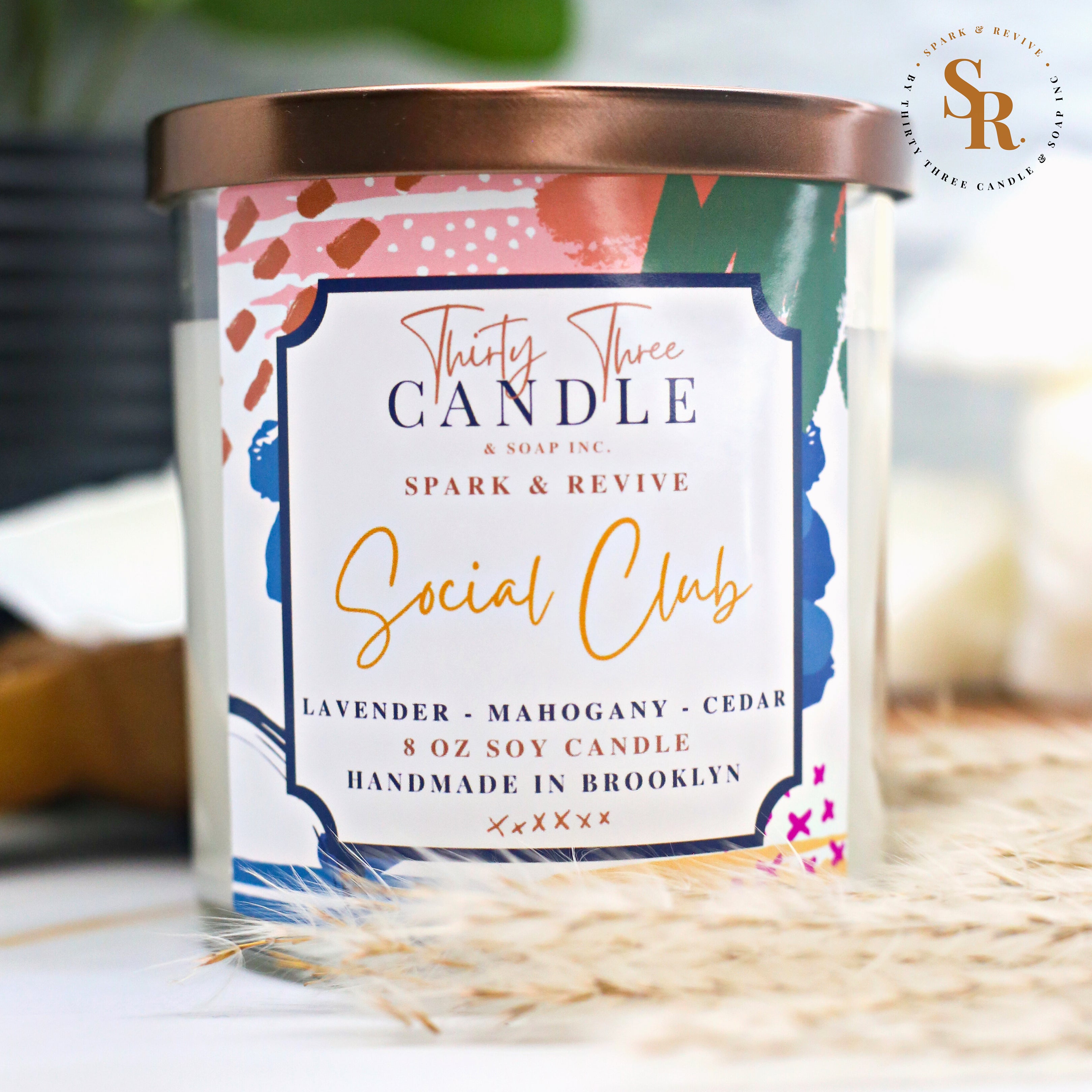 Curl up on the couch or sit in your favorite chair as you take in our Social Club scented soy candle, a rich, warm scent with some spice and comfort.  Cedar wood and oak wood intertwine with warm mahogany to create the perfect masculine scent for any season. Topped with hints of clean lavender, jasmine, lily, and the rosy nuances of geranium, Social Club has plenty of depth and strength.   Social Club is inviting and perfect for year round satisfaction. @SparkandRevive